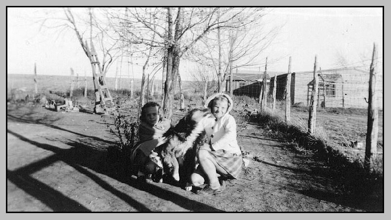 Adrienne Cousin Jean and Tip the Dog grandma turner's house in the background