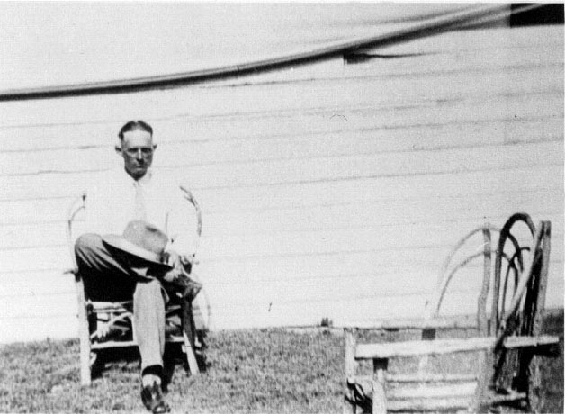 <adron turner posed in chair at port lavaca texas>