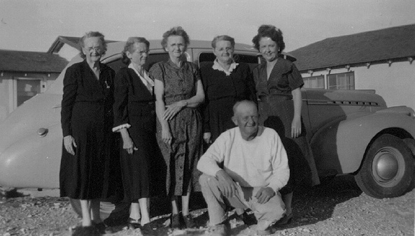 <aunt lizzie's grey chevy car at house, NM>