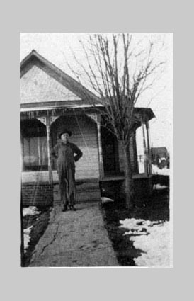 <hardy downer standing in front of downer house texola ok>