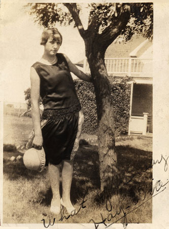 <lady by tree hat in hand creative pose restored by terry>