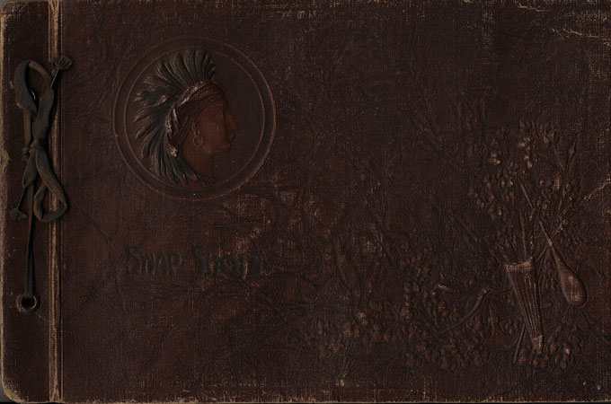 <the covers of Mom's Johnie's photo album>