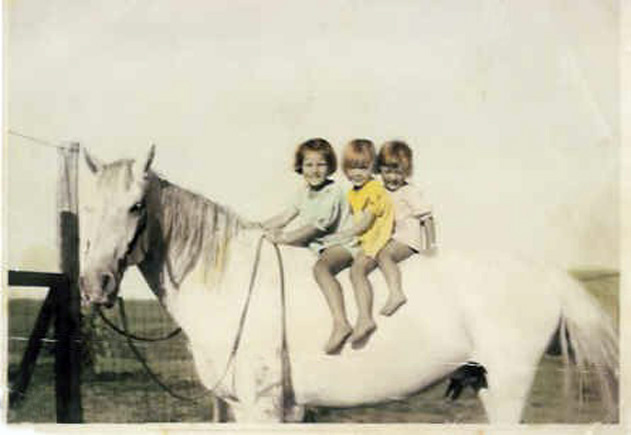 <donna adrienne sheila riding a horse the old grey mare color photo>