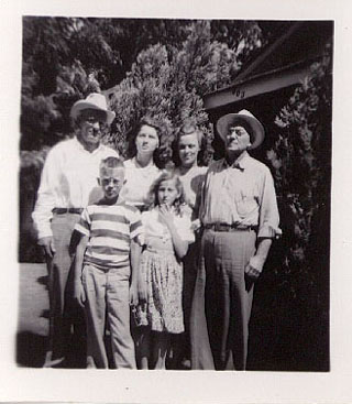 <Back Row:Adron, Donna, Aunt Eddie
Papa Downer. Front Row:
Terry and Carole. >