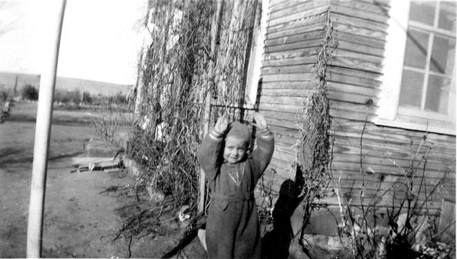 <terry front yard ramon ranch house. I'm this big.>