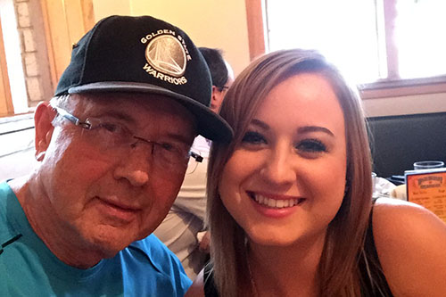 terry wearing a golden state warriors cap and rebecca at 76 birthday party location high desert brewery