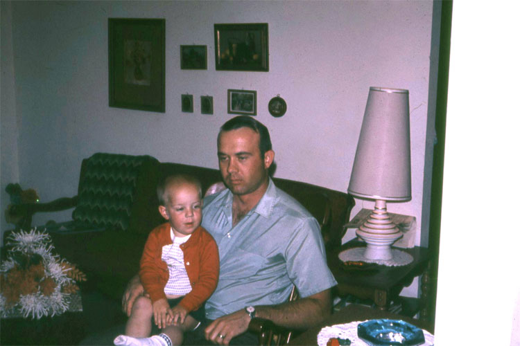 <ron on his dad's lap 1969>