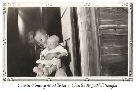 <charlie seagler holding cousin tommy mcallister>