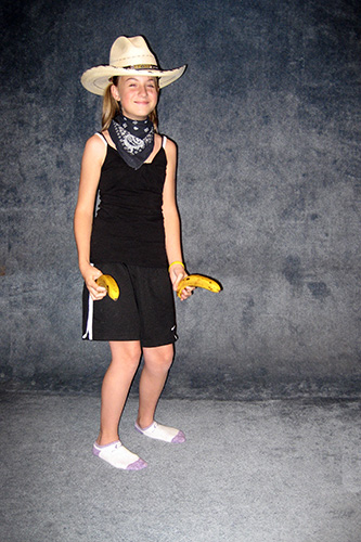 <cowgirl rebecca with bananas>
