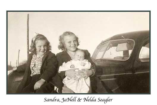 <young sandra young janell baby nelda fender of car>
