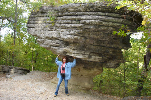 <sara holding up rock>