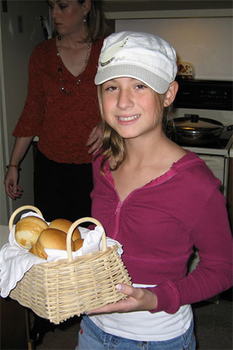 <rebecca cap holding dinner rolls thanksgiving 2006>