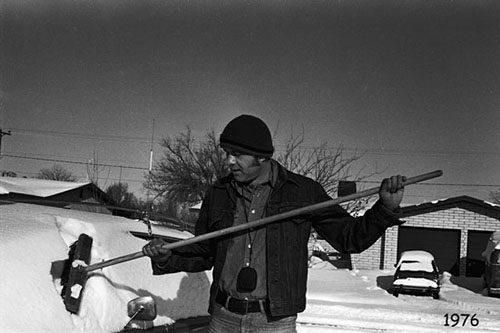 <terry cleaning snow off of car 1976>