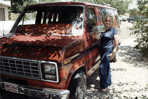 janell standing by red ford van