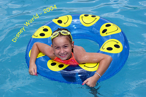 Disney world rebecca swimming smiley face intertube