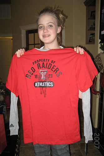 krystal modeling red raiders tee shirt